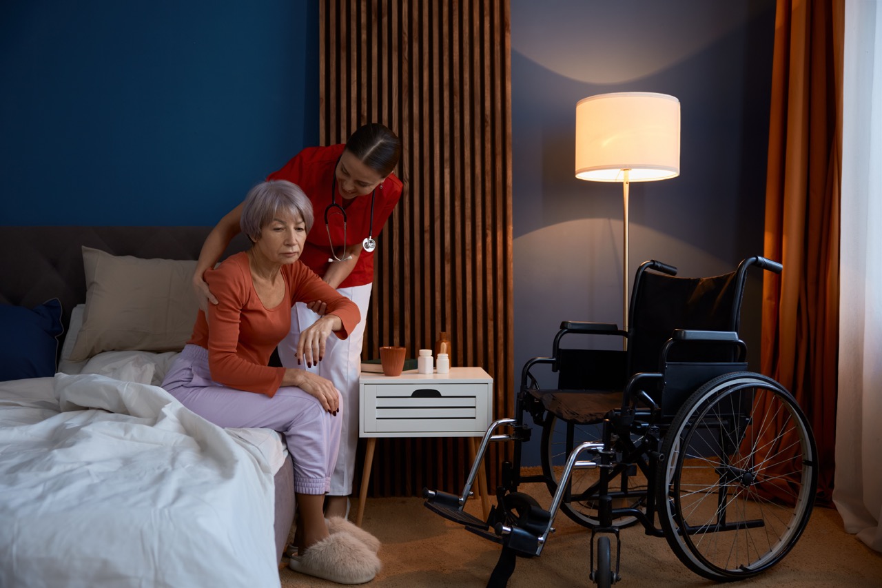 caregiver comforts senior woman at home 2026 01 06 09 16 55 utc Large