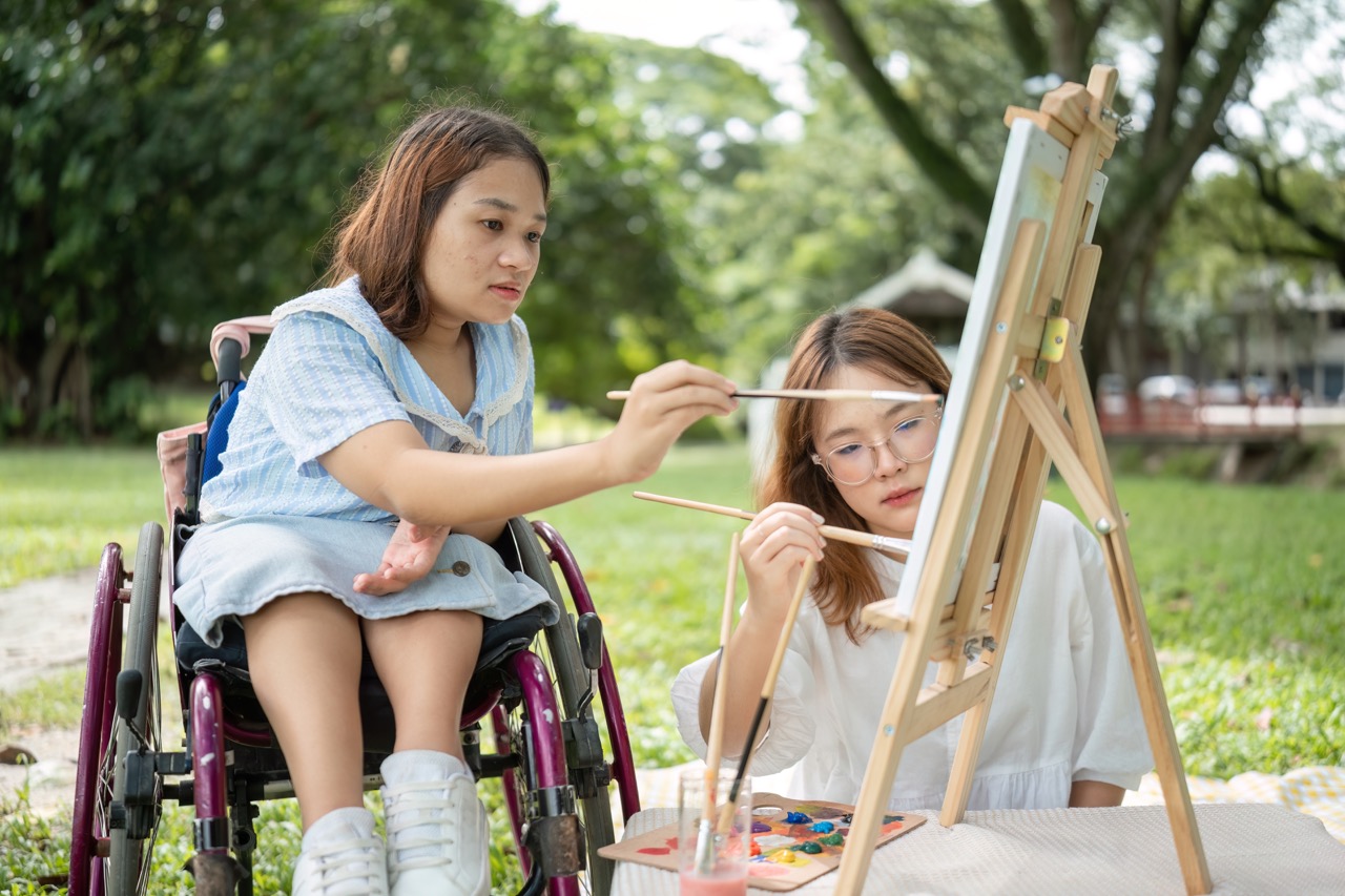 close friends disabled young women drawing togeth 2026 03 17 01 26 04 utc Large