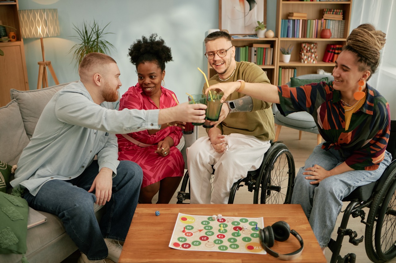 friends toasting drinks at a table indoors 2026 01 09 11 55 55 utc Large